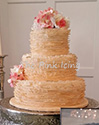 Gold ruffled wedding cake